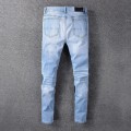 602 amiri multiple patches jeans blue color