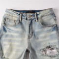 #839 amiri white patch jeans blue
