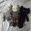 MAND KAWS holiday hong kong limited plush doll black brown grey